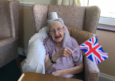 Resident with hat and Union Jack flag for the Royal Wedding