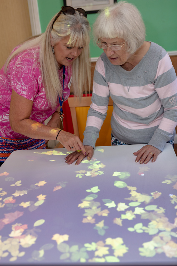 The magic table provides lots of interactive fun for residents, while promoting hand-eye co-ordination, socialising and cognitive function