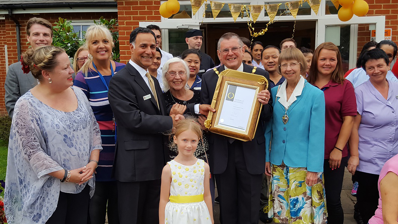 Princess Christian team with the Mayor for the Home's Investors In People Gold Award presentation in 2016