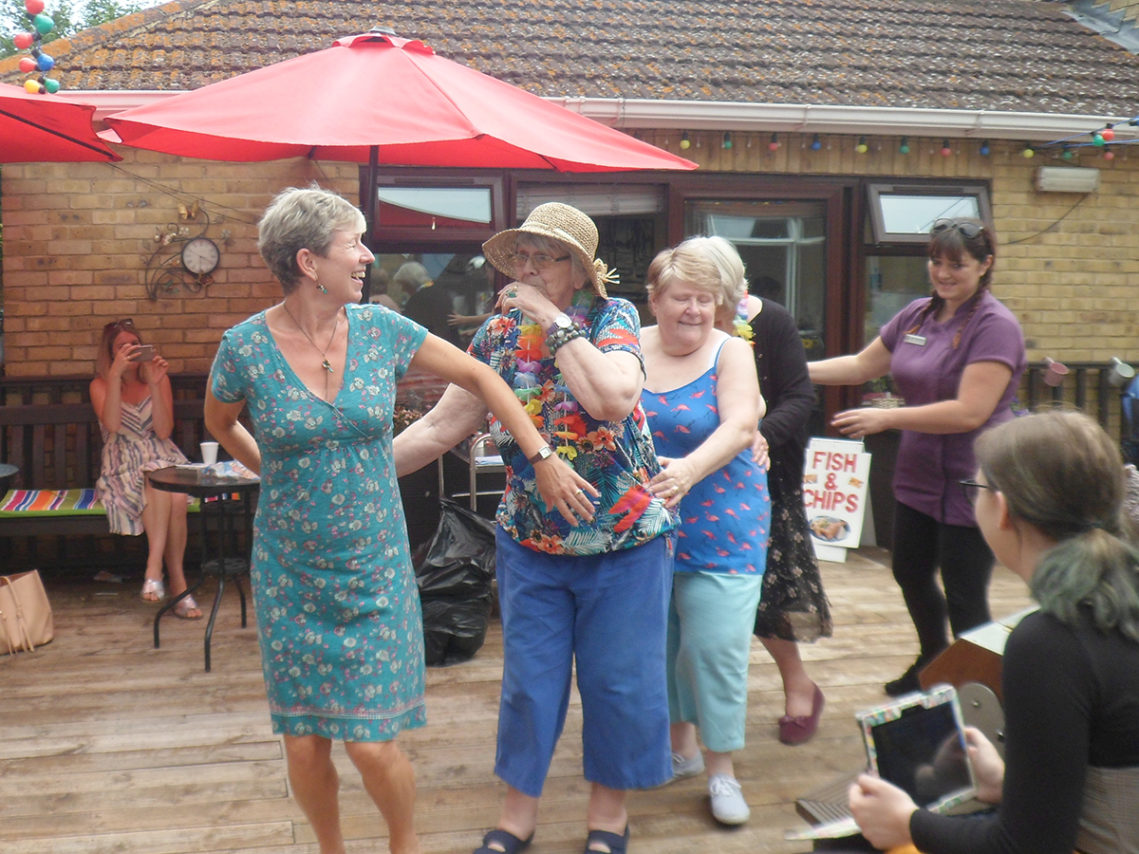 Residents and staff at St Winifreds Care Home dancing at the seaside themed party