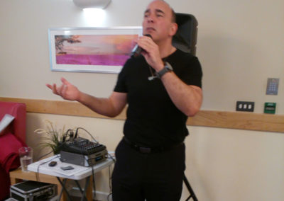 Live singer Storm King performing for residents at Hengist Field Care Home