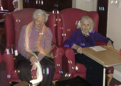 Residents at Lulworth House enjoying a bubble filled room during a sensory exploration session