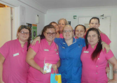 The Woodstock Team of Care Assistants and Team Leaders smile for the camera