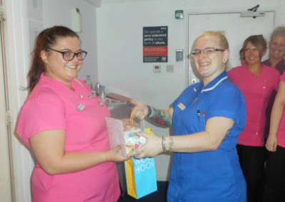 Woodstock Team Leader wishing Care Assistant Sian a fond farewell