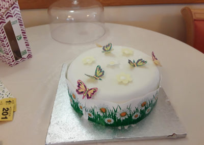 Hengist Field Care Home baked and decorated a stunning fruit cake with Macmillan logos