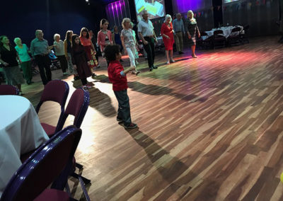 Residents and the people on the dance floor at the Strictly Tea Dance