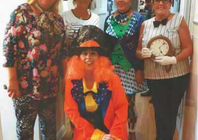 Gill Redsell and staff team at Meyer House Care Home dressed as Mad Hatters