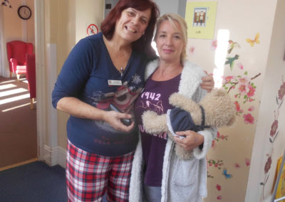 Two staff members at Woodstock Residential Care Home wearing pyjamas for the day to raise money for The Alzheimer's Society