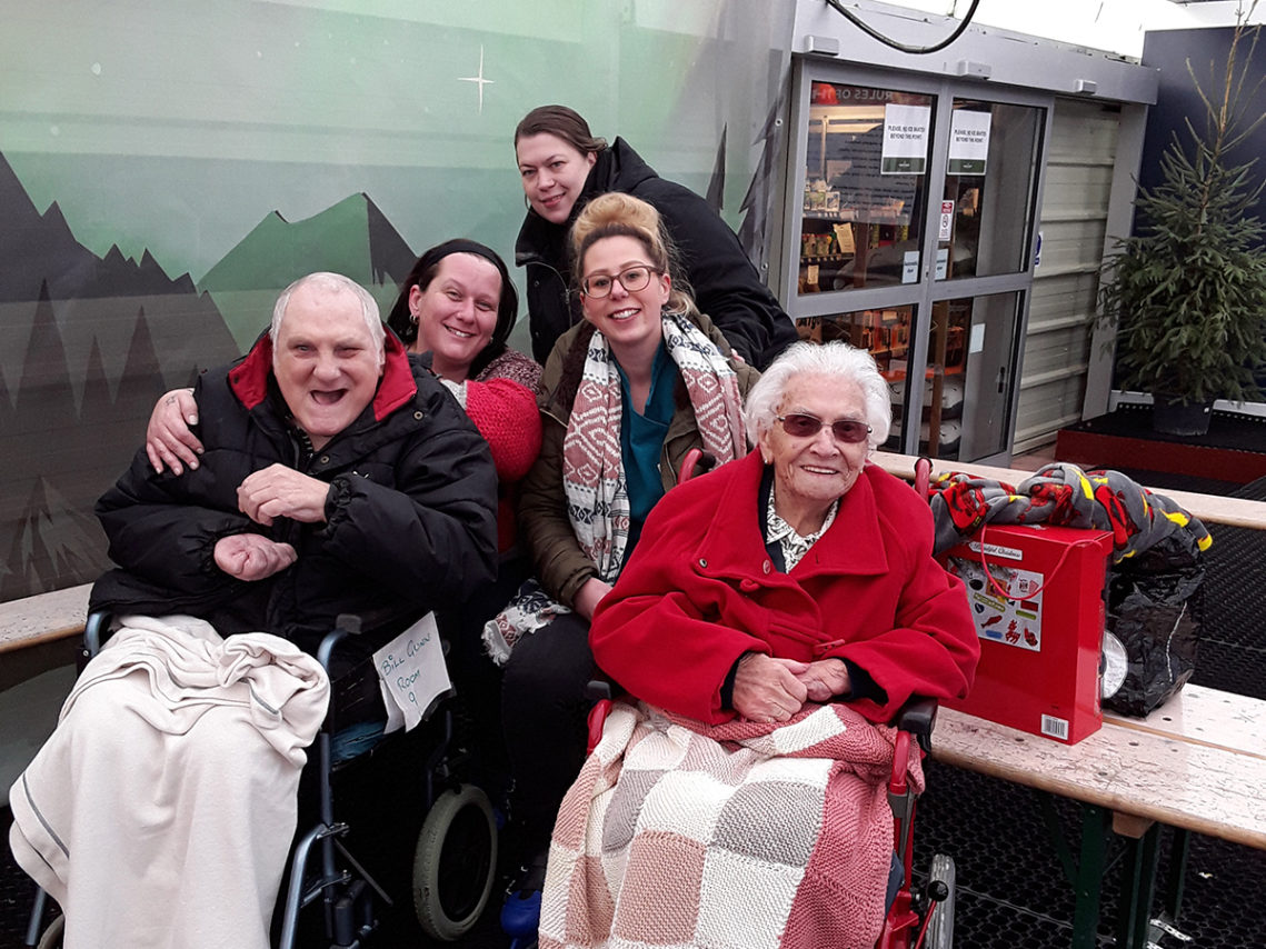 Residents and staff from Meyer House Care Home at a local ice skating rink