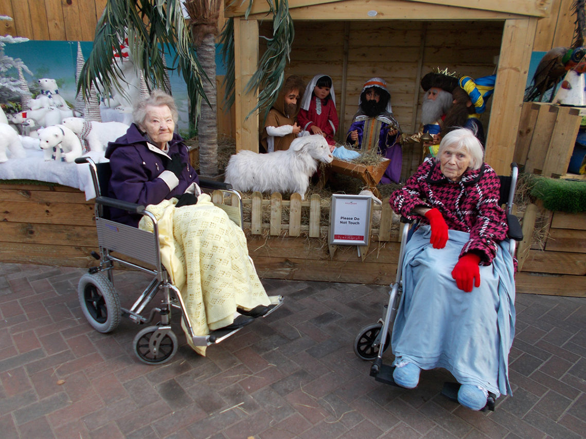 Sonya Lodge residents admiring Ruxley Manor's amazing nativity scenes