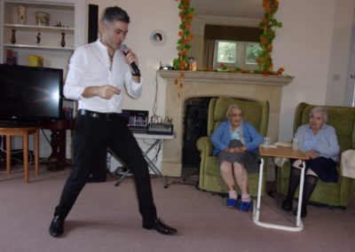 Kevin Walsh performing to residents at Loose Valley Care Home