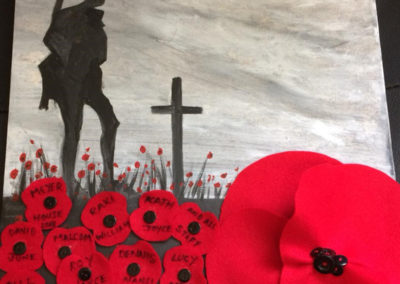 Meyer House painted a lonely soldier picture and decorate with handmade felt poppies