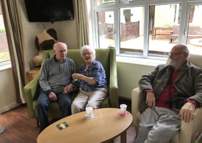 Lulworth House Residential Care Home residents socialising in their lounge