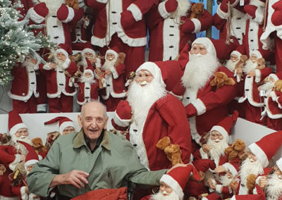 Lukestone Care Home male resident by a Santa display at Polhill Garden Centre