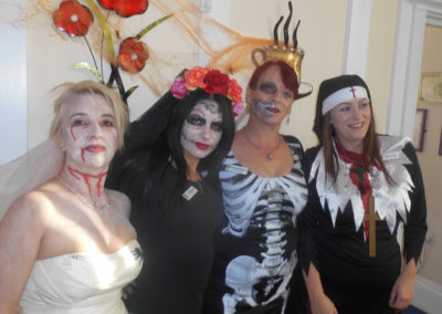 Staff from Woodstock Residential Care Home dressed in Halloween costumes