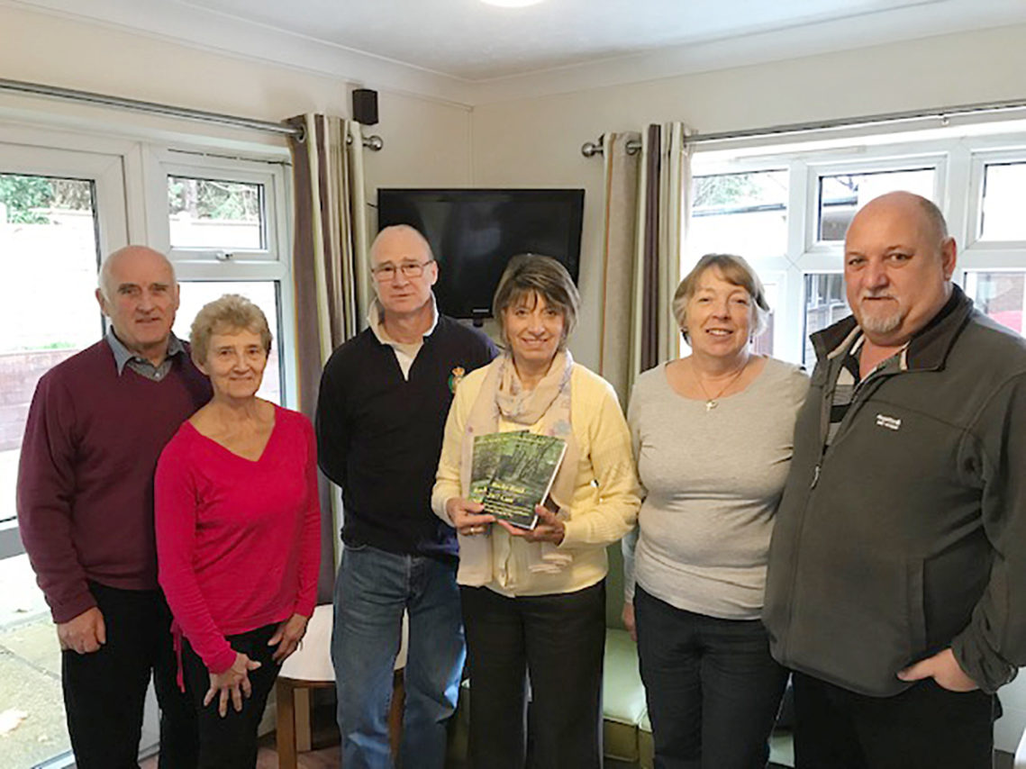 Author Sylvia Bryden-Stock with families on her visit to Lulworth House Residential Care Home
