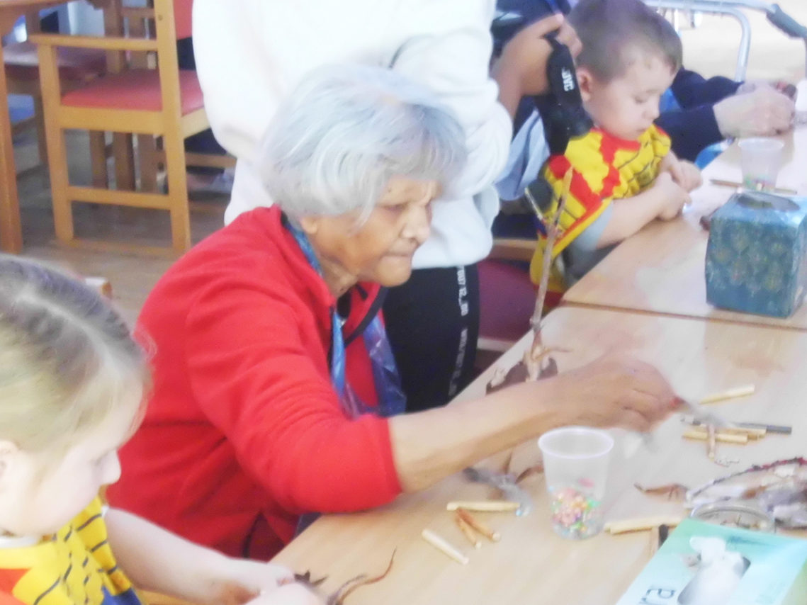 Woodstock residents making clay crafts with Squirrel Nursery children
