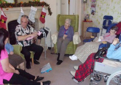 Mark the magician with residents in the lounge at Loose Valley Care Home