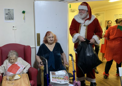 Residents at Lulworth House receiving a surprise visit from Santa