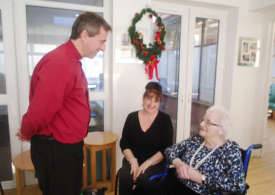 Reverend Jim chatting to residents at The Old Downs
