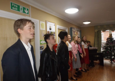 St John the Baptist School pupils performing Grease for residents at Princess Christian