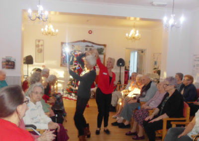 Woodstock Residential Care Home resident dancing with a staff member