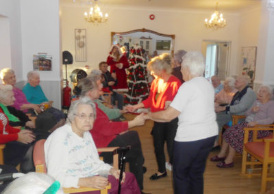 The lounge at Woodstock Residential Care Home packed with residents and visitors during the Christmas Party