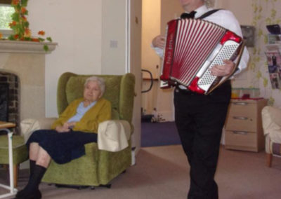 Accordionist Bing Lyle entertaining Loose Valley Care Home residents