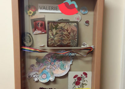 Resident Valerie's Memory Box containing a beaded necklace