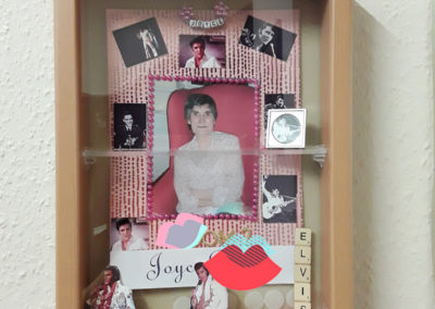 Resident Joyce's Memory Box containing pictures of Elvis