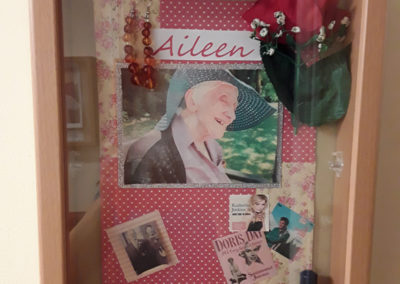 Resident Aileen's memory box containing photos and jewellery