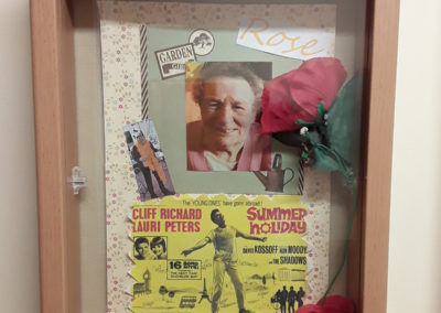 Resident Rose's memory box containing a Cliff Richard postcard