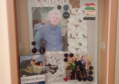 Resident Moira's memory box containing an Edinburgh pocket guide