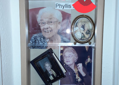 Resident Phyllis' memory box containing old photos