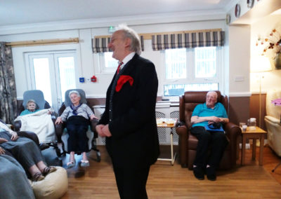 Magician performing for the residents of Meyer House Care Home