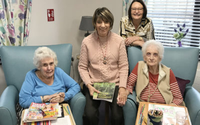Author Sylvia Bryden-Stock with staff and residents at St Winifreds Care Home