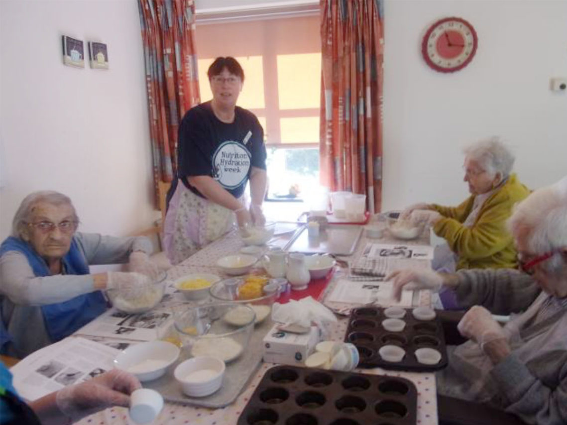 Paula baking with the ladies at Loose Valley Care Home