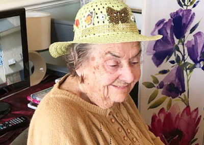 Lady resident at Silverpoint Court Residential Care Home wearing an Easter bonnet 1