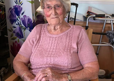 Lady resident at Silverpoint Court Residential Care Home wearing an Easter bonnet 2