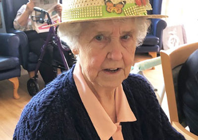 Lady resident at Silverpoint Court Residential Care Home wearing an Easter bonnet 3
