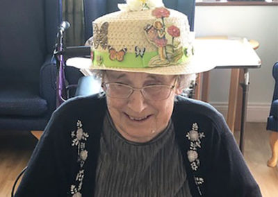 Lady resident at Silverpoint Court Residential Care Home wearing an Easter bonnet 5