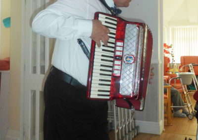 Bing Lyle playing his accordion