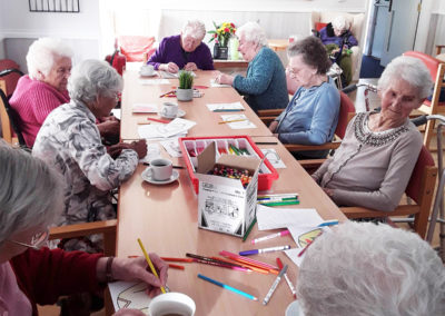 Woodstock ladies doing an arts and crafts activity together