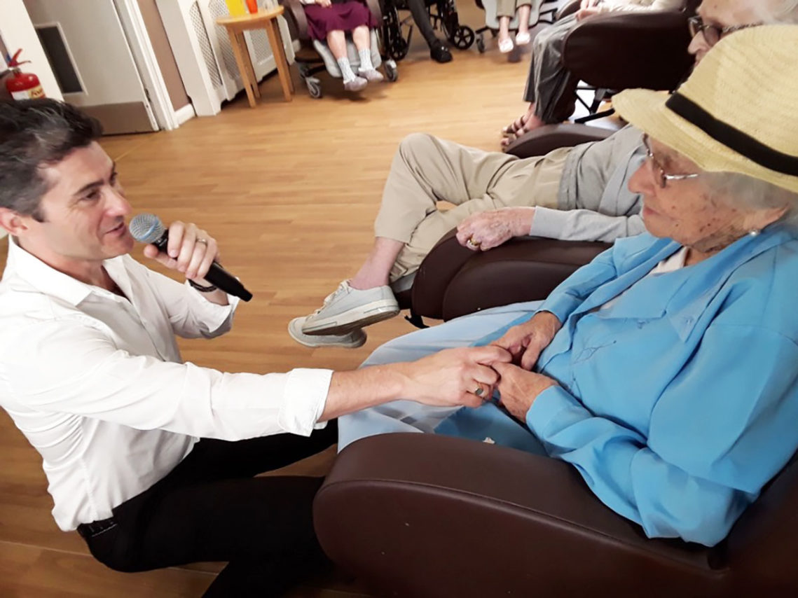 Singer Kevin Walsh entertains residents at Meyer House Care Home