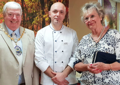 Princess Christian Head Chef Adrian Silaghi with the Mayor and his wife