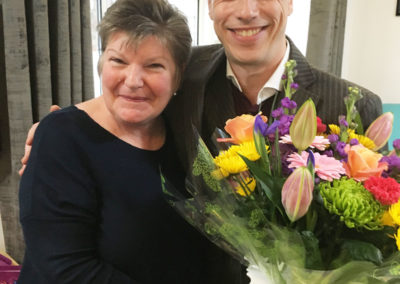 Jean Wright, Manager of Sonya Lodge, with Nellsar Managing Director, Martin Barrett being presented with flowers