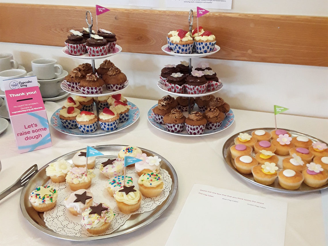 Display of cupcakes on stands at Hengist Field Care Home