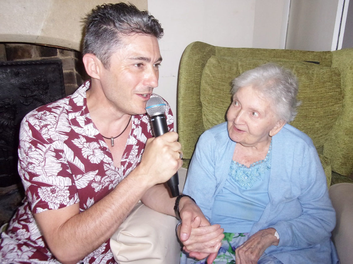 Kevin Walsh with a lady resident at Loose Valley Care Home