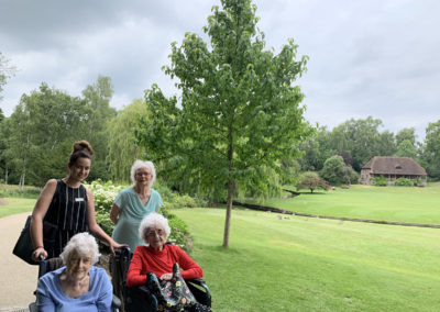 Staff and residents enjoying the grounds at Leeds Castle