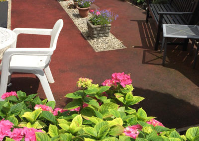 Meyer House Care Home garden with freshly planted flowers 2